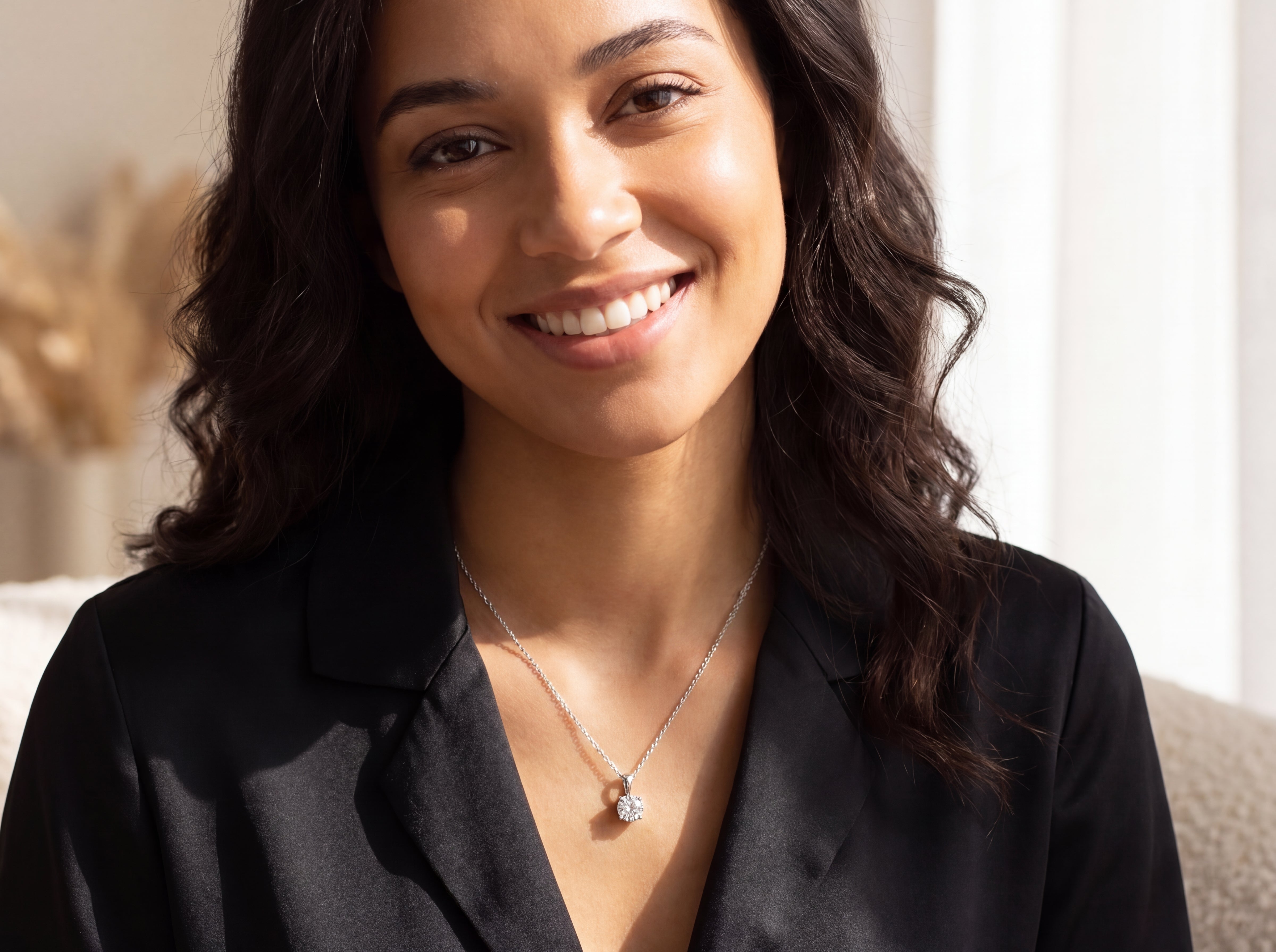 Model wearing 1 ct. solitaire diamond pendant necklace
