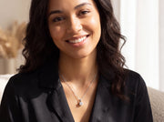 Model wearing 1 ct. solitaire diamond pendant necklace